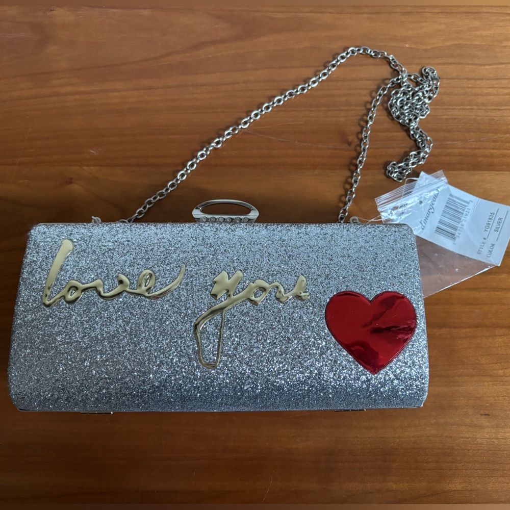 Glittering Silver Clutch with Red Heart Accent